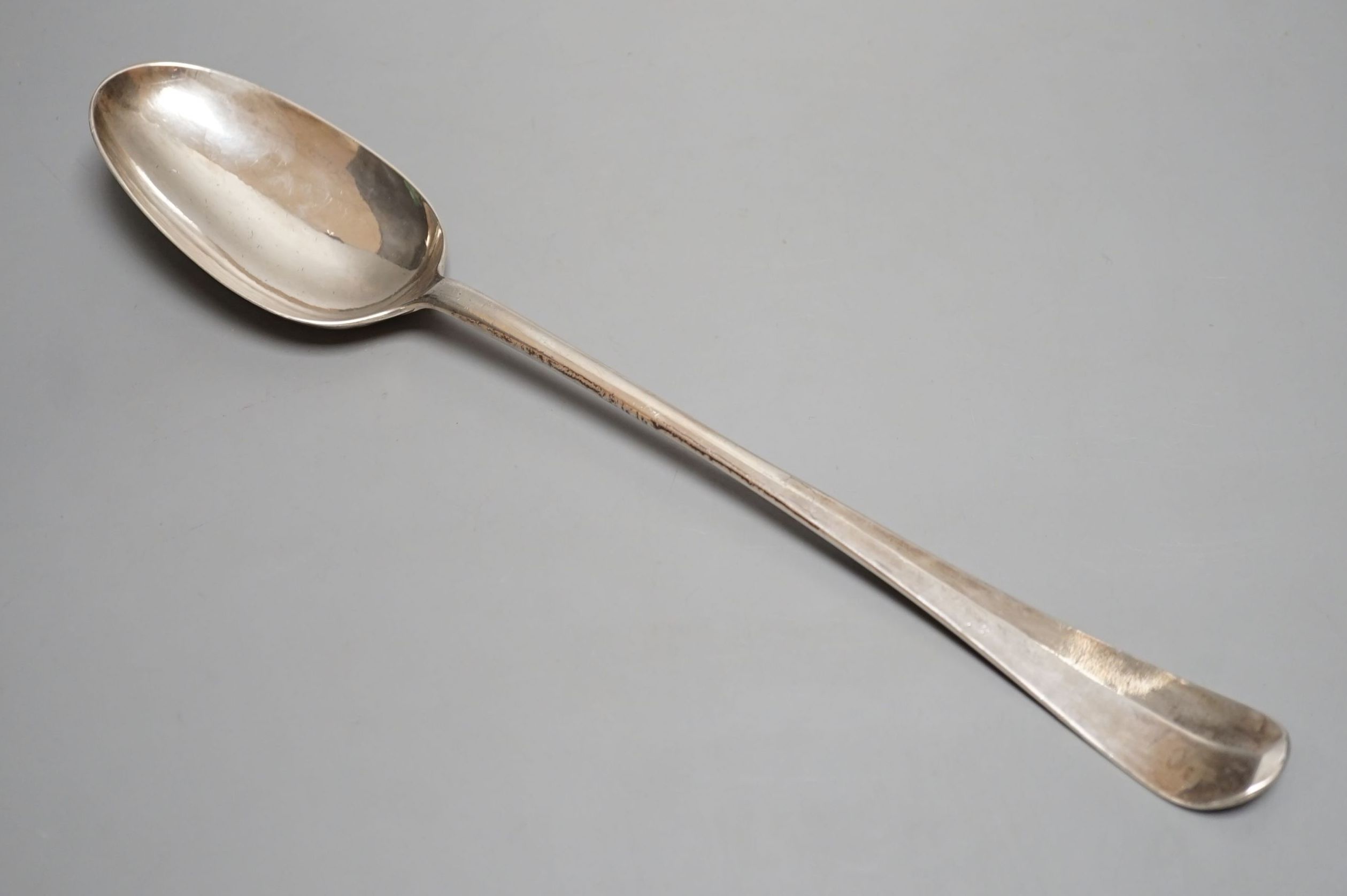 A George II silver Hanovarian pattern hash spoon spoon, makers mark worn, possibly John Harvey I?, with shell back bowl, London, 1742, 36cm